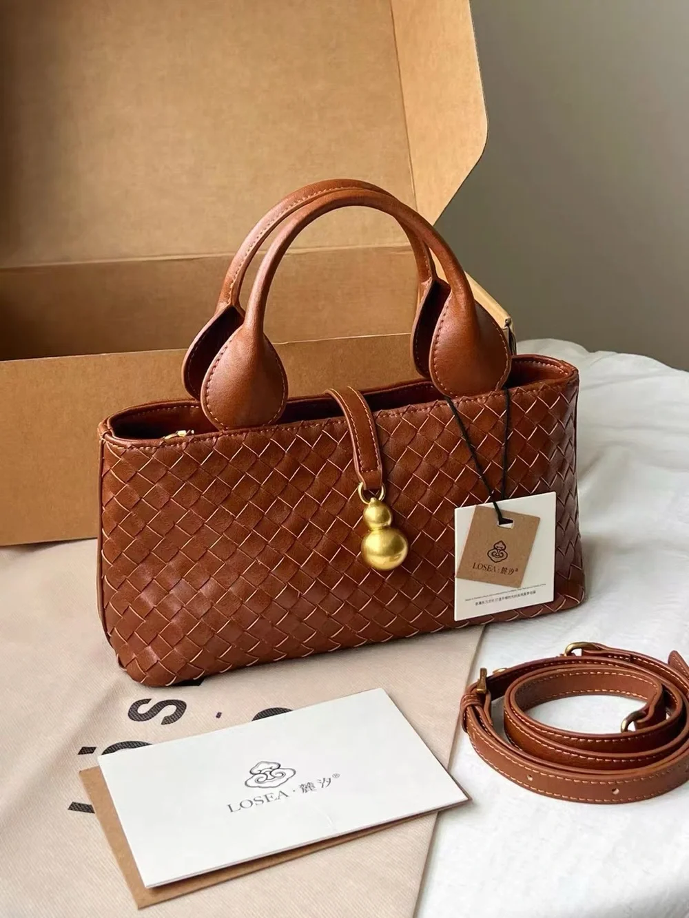 Brown Woven Leather Top-Handle Bag with Gold Accent